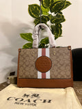 Co@ch Dempsey Carryall Signature Bag